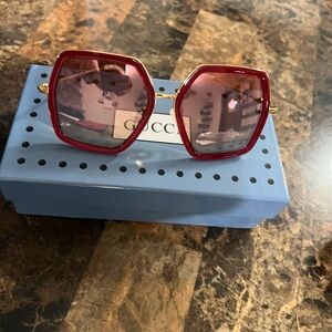 Gucci GG0106S 010 sunglasses